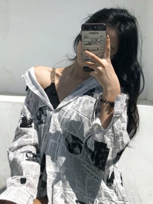 longsleeve shirt with newspaper print