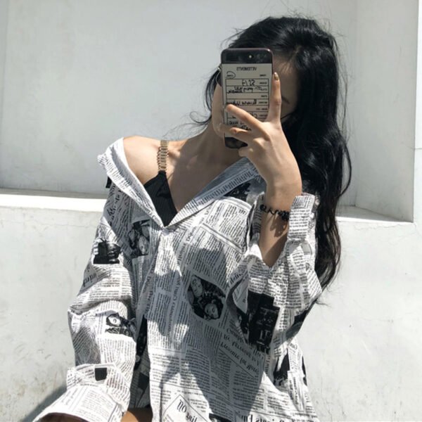 longsleeve shirt with newspaper print