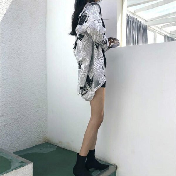 longsleeve shirt with newspaper print