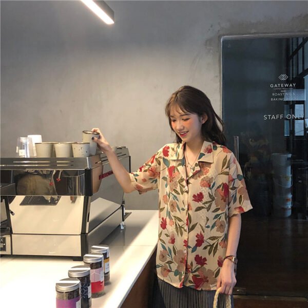 shortsleeved button down blouse with floral print