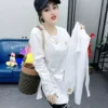 mid length white t shirt women's patchwork shirt design 2024 spring long sleeved loose layered inner layering shirt