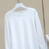 european station 2024 spring cuff shirt splicing loose mid length white t shirt layered with a base layer