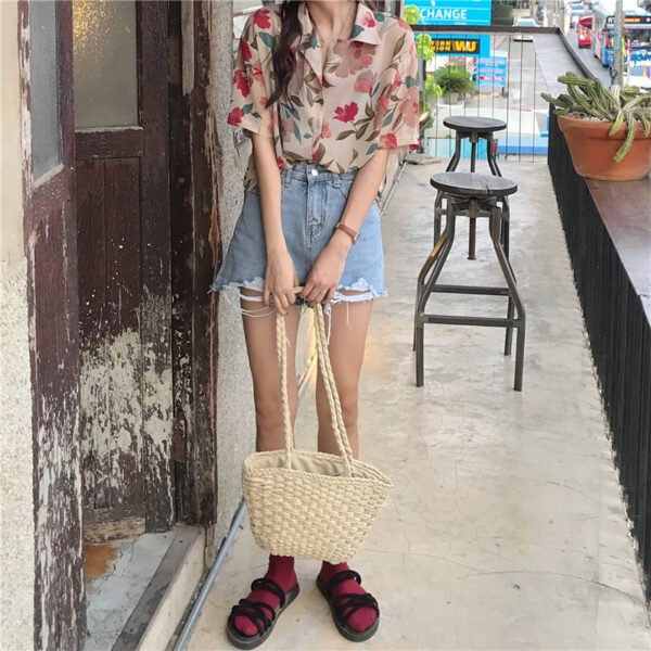 shortsleeved button down blouse with floral print