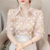 floral blouse with three dimensional decoration