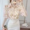 floral blouse with three dimensional decoration