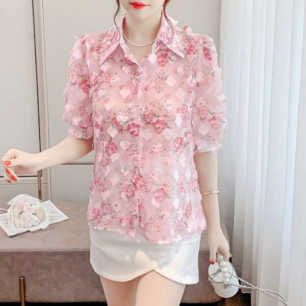 floral blouse with three dimensional decoration