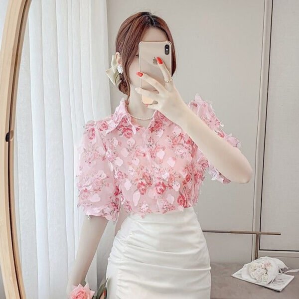 floral blouse with three dimensional decoration