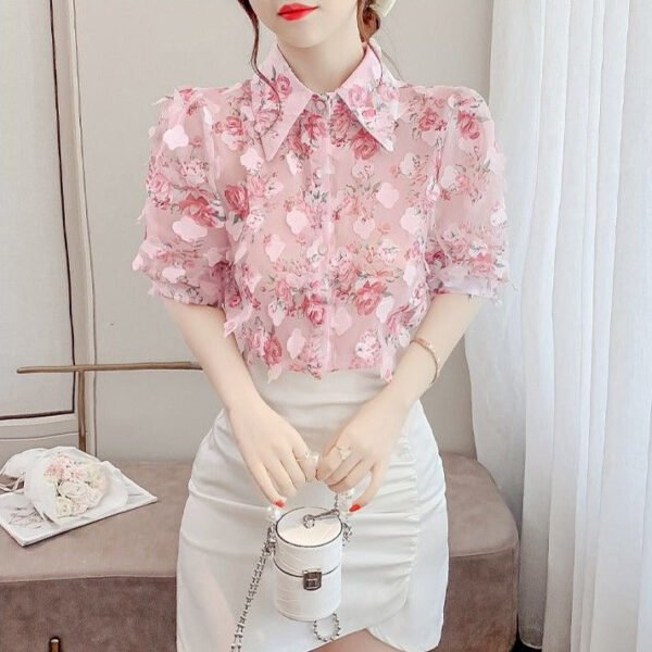 floral blouse with three dimensional decoration