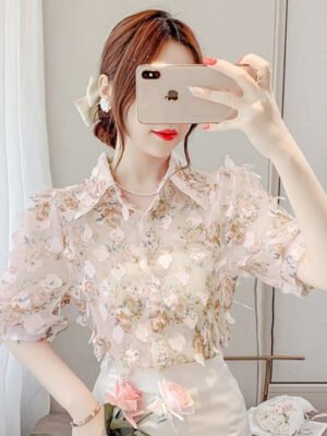 floral blouse with three dimensional decoration