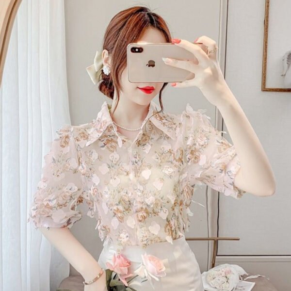 floral blouse with three dimensional decoration