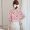 floral blouse with three dimensional decoration