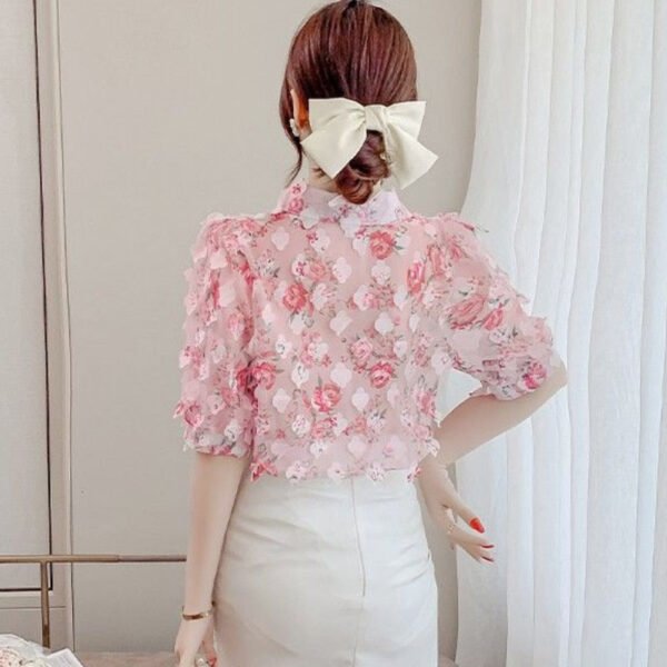 floral blouse with three dimensional decoration