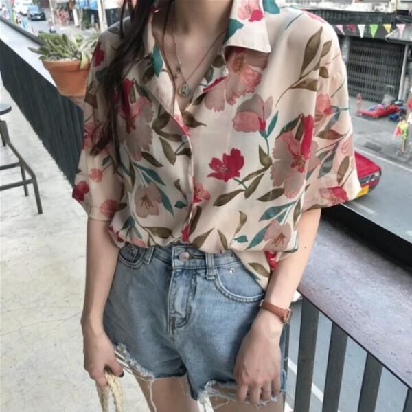 shortsleeved button down blouse with floral print