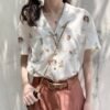 collared blouse with short sleeves and angel print