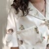 collared blouse with short sleeves and angel print