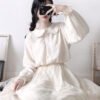 button down blouse with lantern sleeves and frill accents