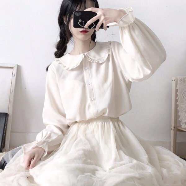 button down blouse with lantern sleeves and frill accents