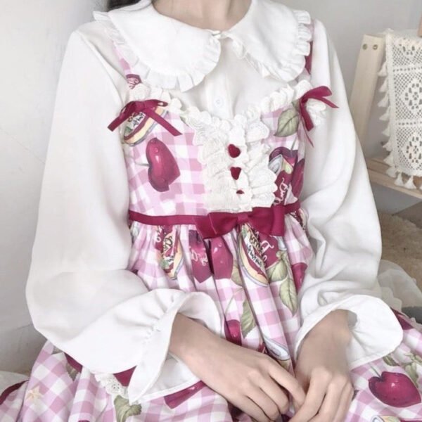 button down blouse with lantern sleeves and frill accents