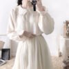 button down blouse with lantern sleeves and frill accents