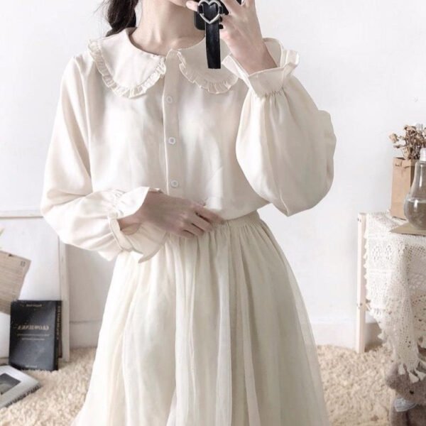 button down blouse with lantern sleeves and frill accents