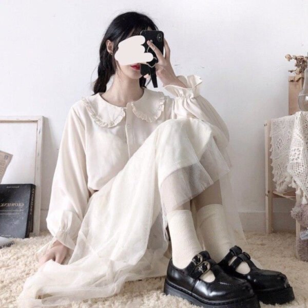 button down blouse with lantern sleeves and frill accents