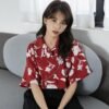 shortsleeved button down shirt with floral print