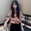 shortsleeved button down shirt with floral print